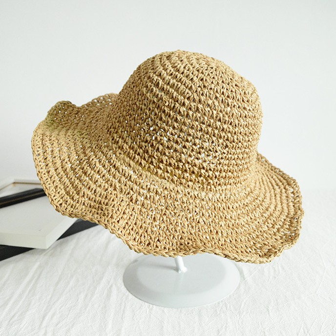 Straw Sun Hat With Wide Brim Round Crown and Natural Weave Texture Ide