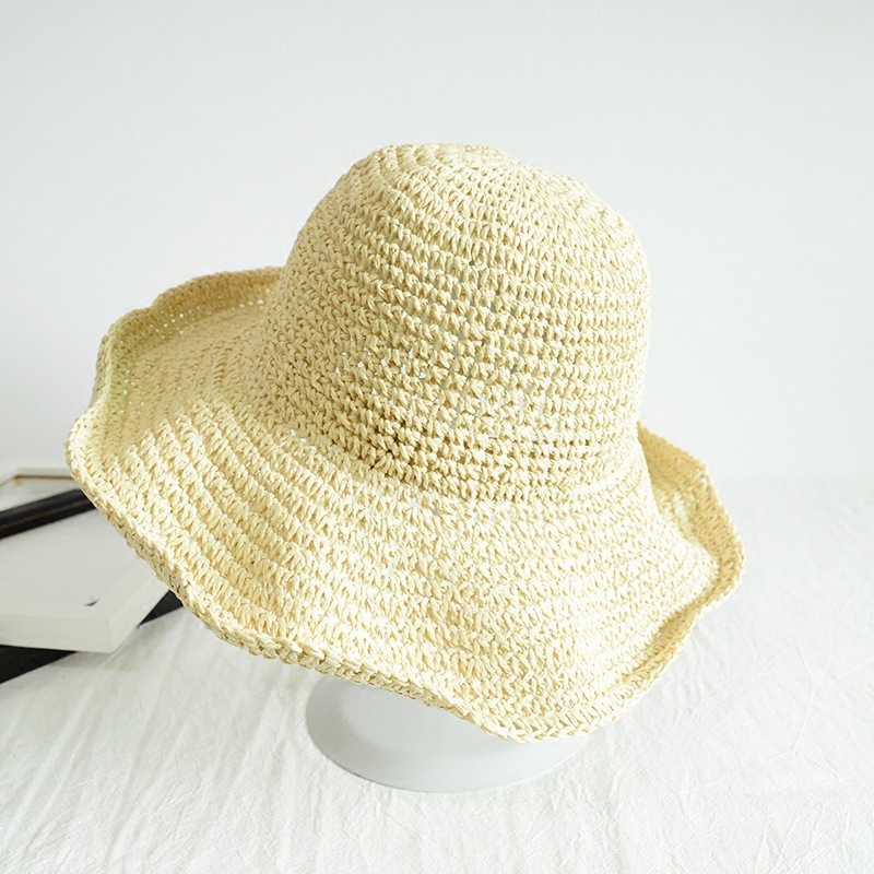 Straw Sun Hat With Wide Brim Round Crown and Natural Weave Texture Ideal for Coastal Styling