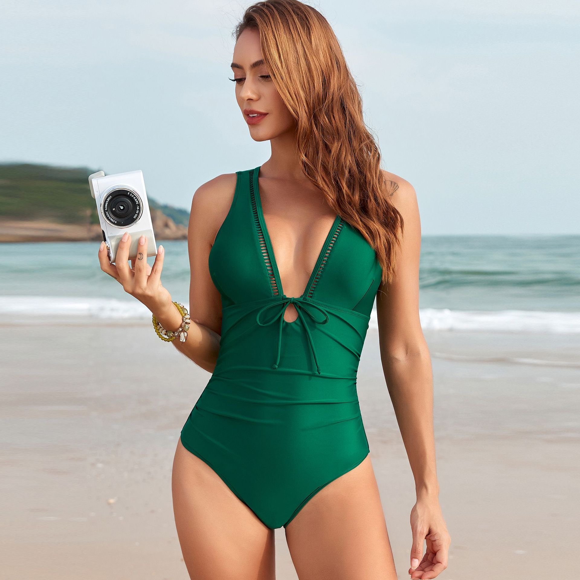 Plunging V-Neck One-Piece Swimsuit with Cut-Outs and Tie Detail
