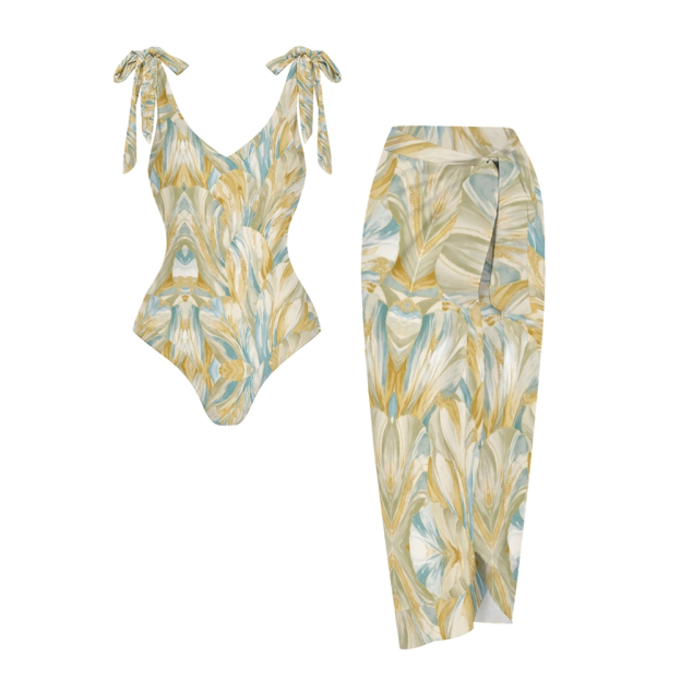 Elegant Two-Piece Beachwear Set with Deep V Swimsuit and Matching Sarong Skirt