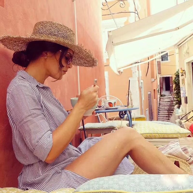 Straw Sun Hat With Wide Brim Round Crown and Contrast Band Perfect for Beach Styling