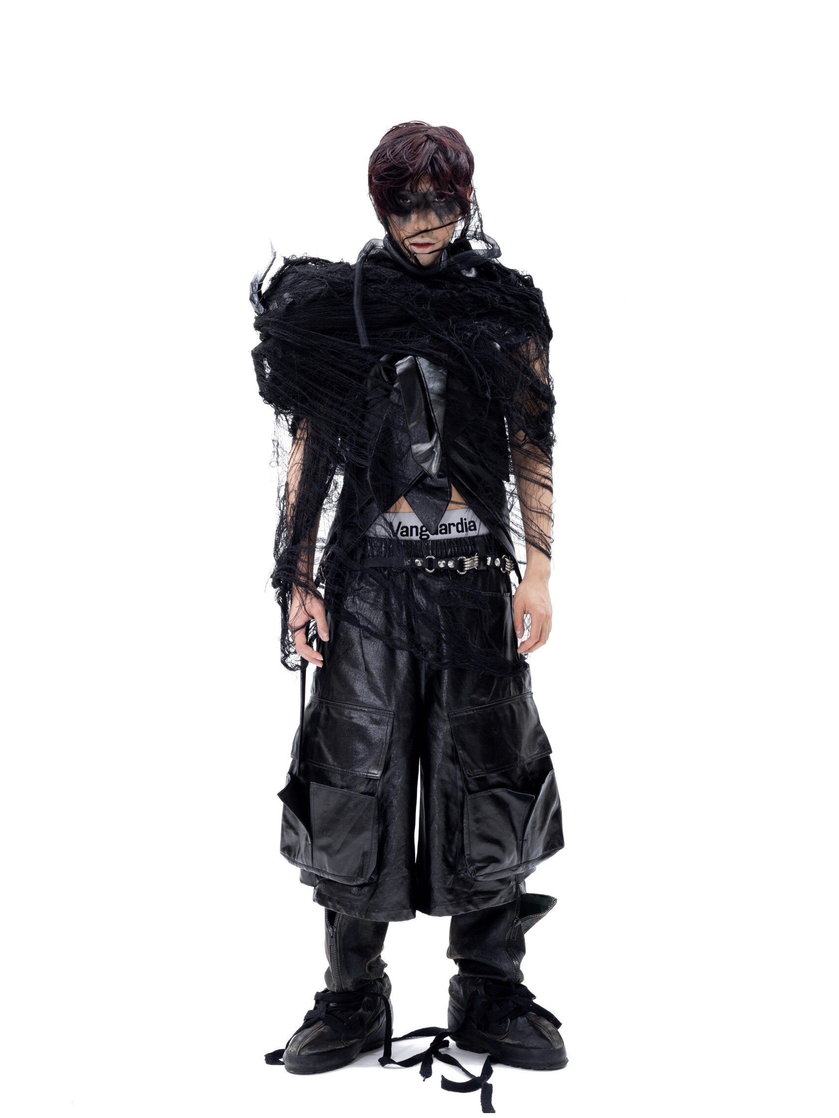 “Twisted Axis“ Coated Deconstructed Capris