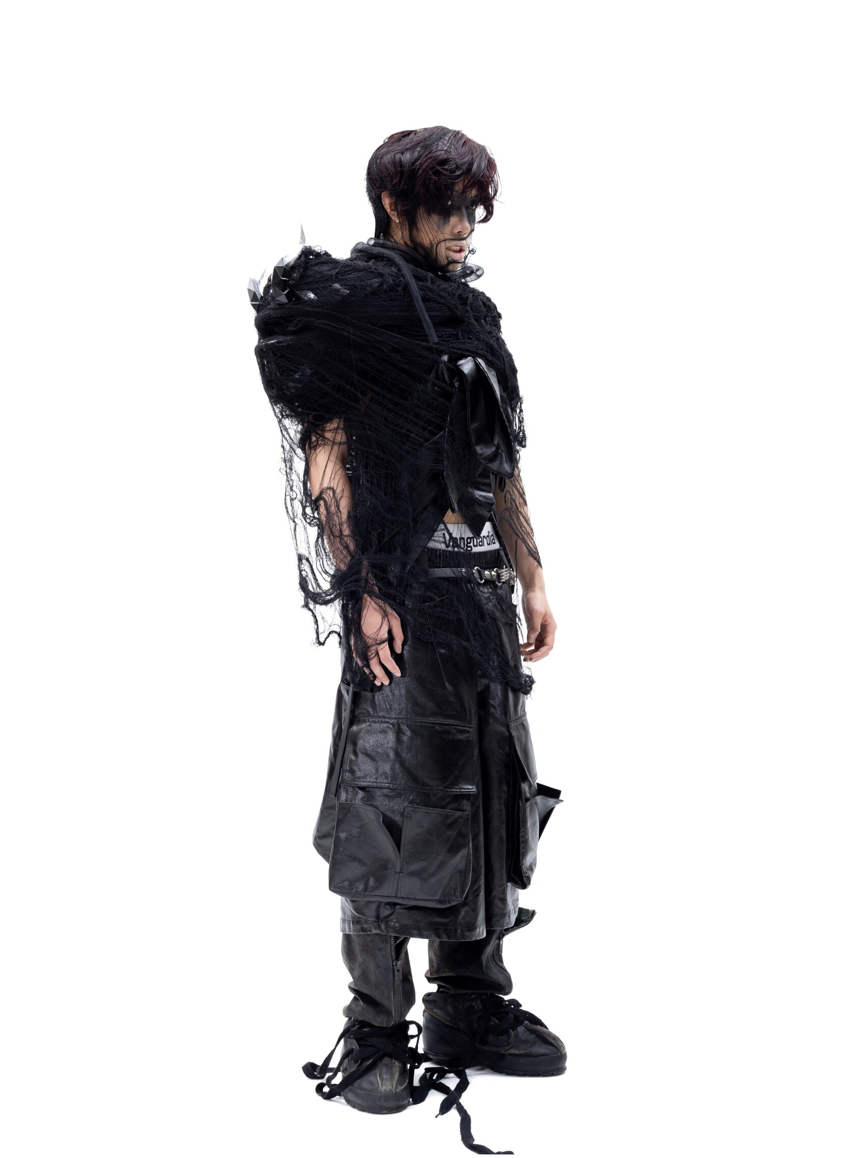 “Twisted Axis“ Coated Deconstructed Capris