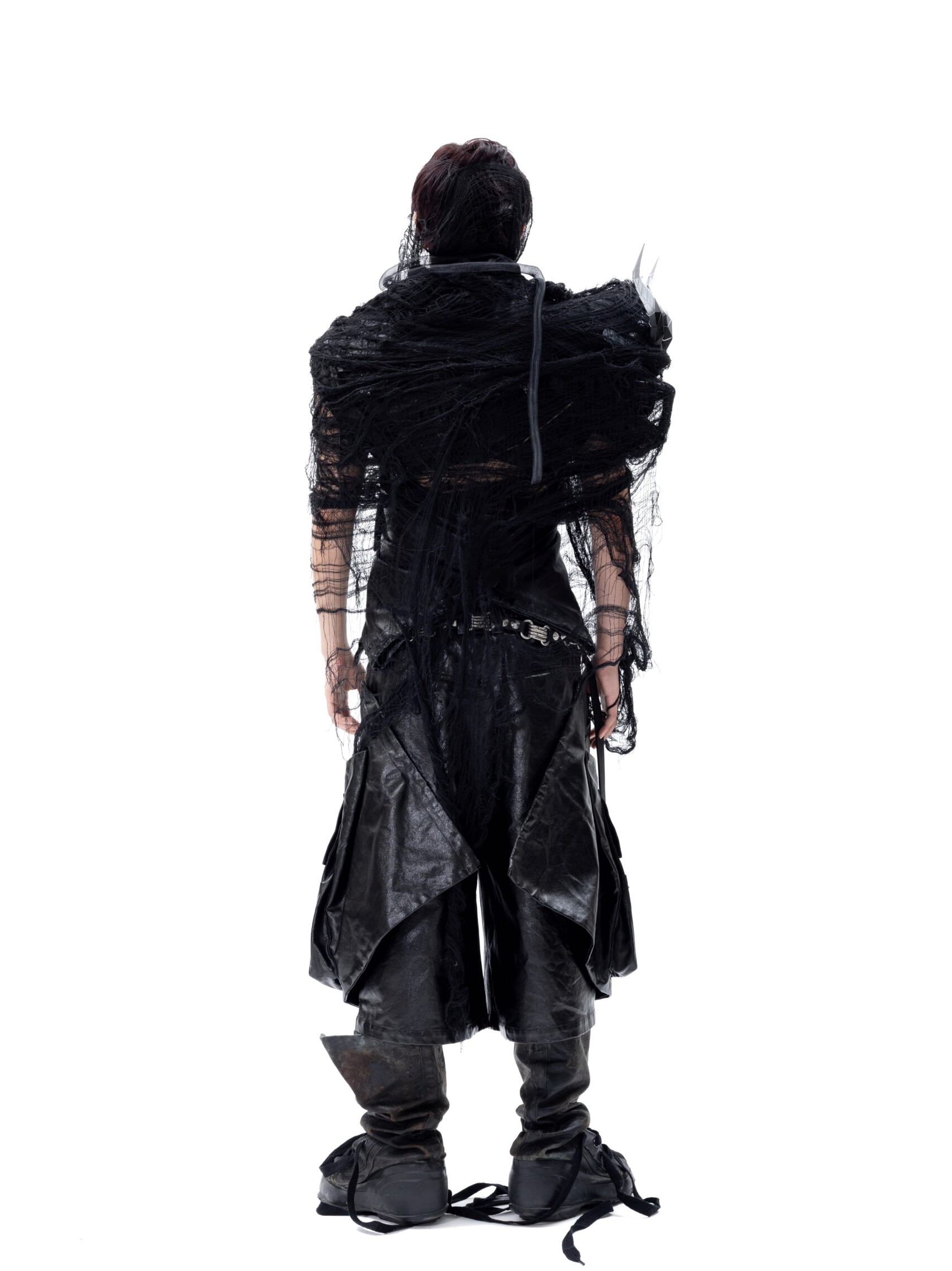 “Twisted Axis“ Coated Deconstructed Capris