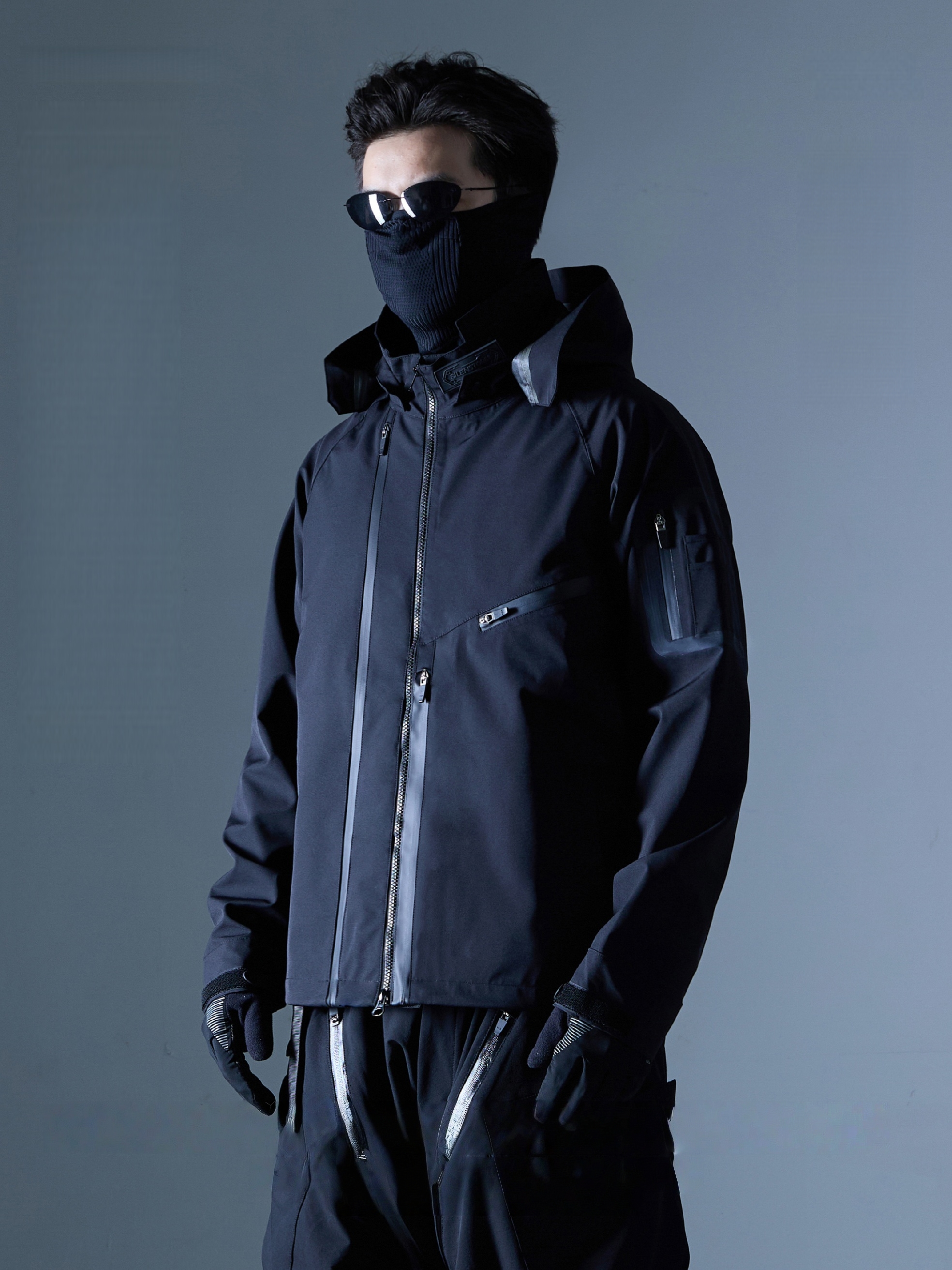 Fully Taped Hard Shell Jacket with Layered Pockets