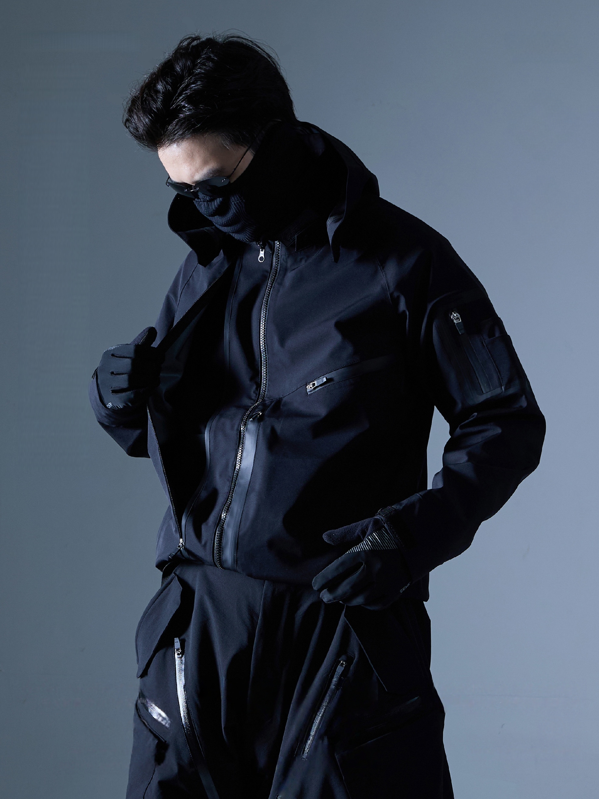 Fully Taped Hard Shell Jacket with Layered Pockets