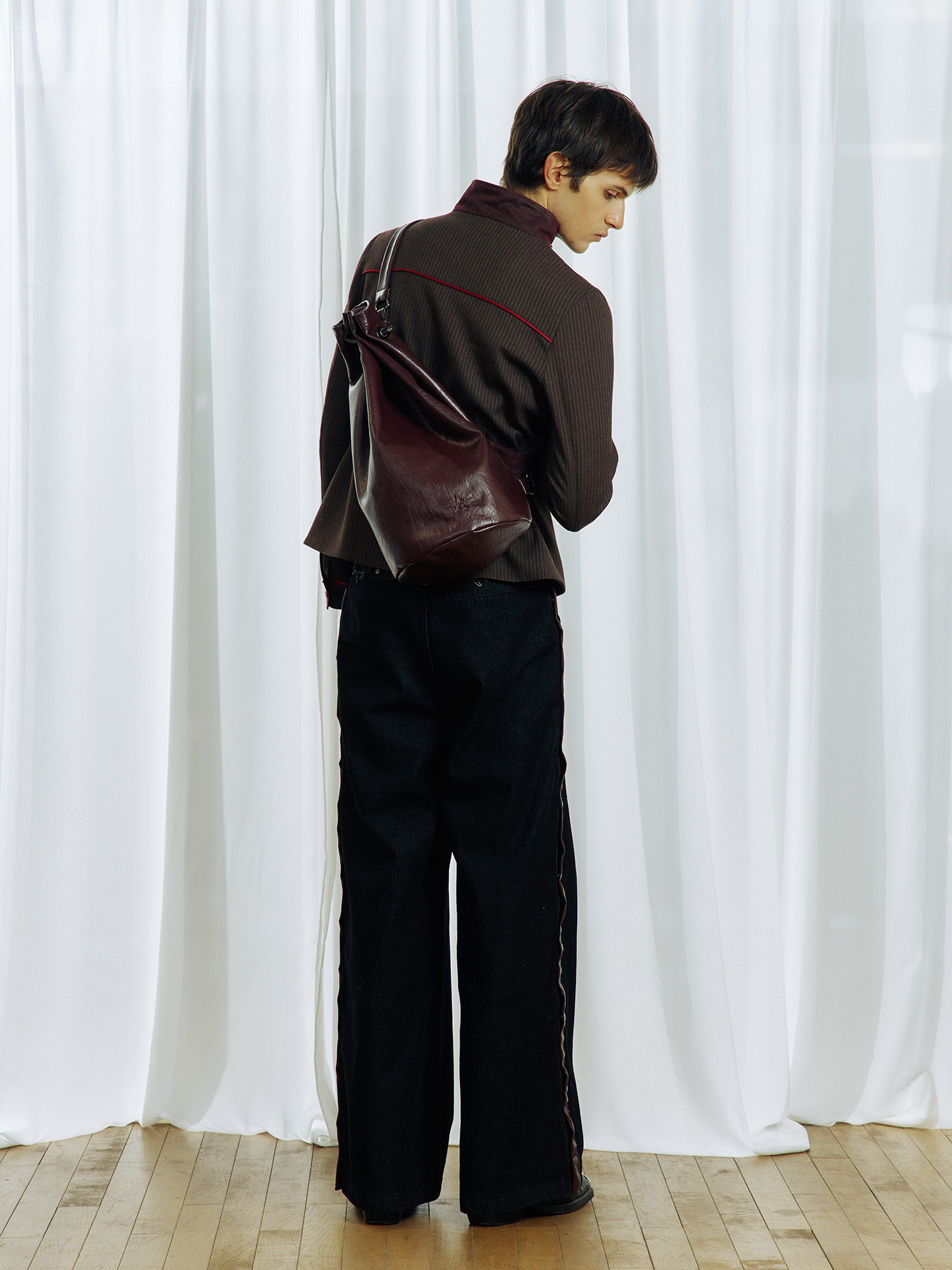 Spiral End Arrow Tube Bag