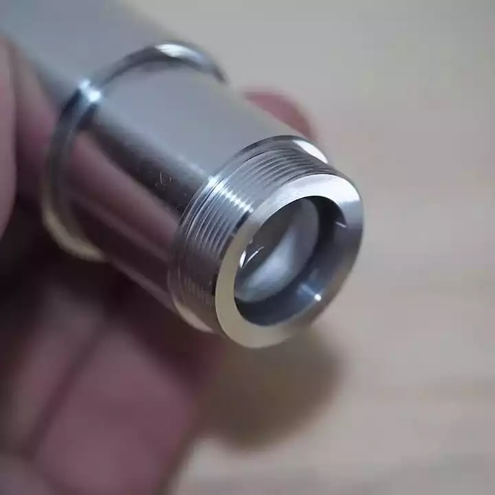 10X freely extendable lens for fiber lasers