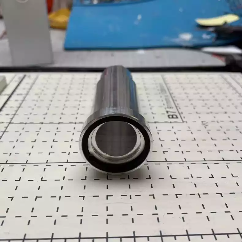 10X freely extendable lens for fiber lasers