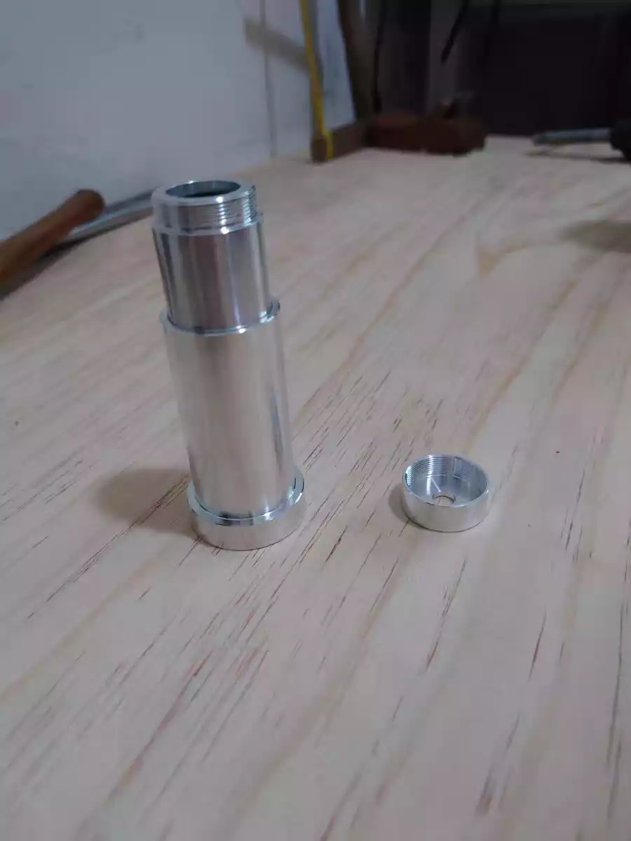 10X freely extendable lens for fiber lasers