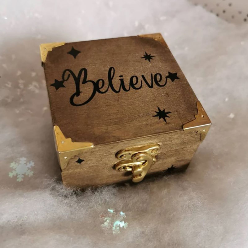 A Beautiful Magical Believe Bell in a Rustic Christmas Eve Box or a Gift from Santa