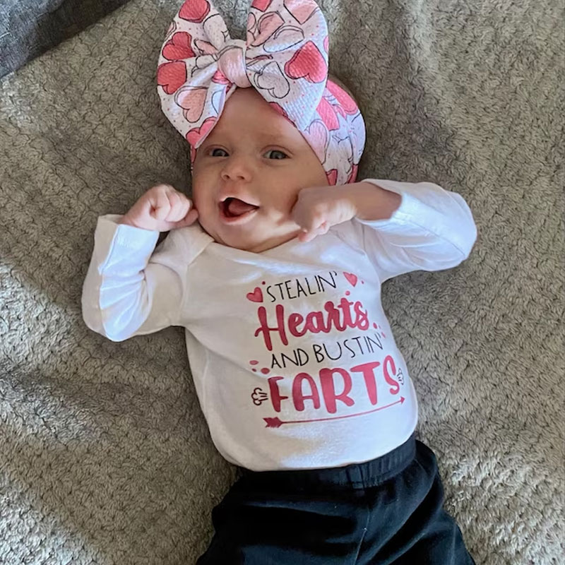 Stealin' Hearts and Bustin' Farts Baby Bodysuit