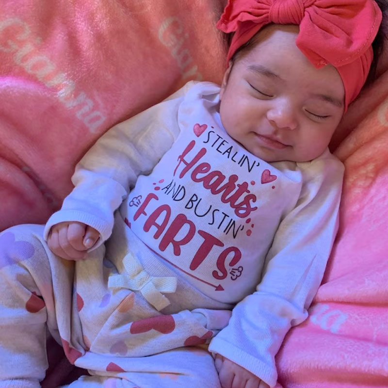 Stealin' Hearts and Bustin' Farts Baby Bodysuit