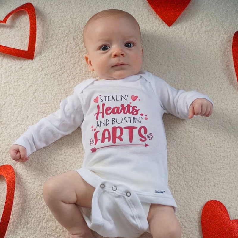 Stealin' Hearts and Bustin' Farts Baby Bodysuit