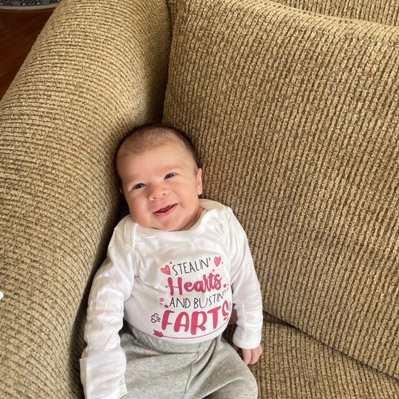 Stealin' Hearts and Bustin' Farts Baby Bodysuit