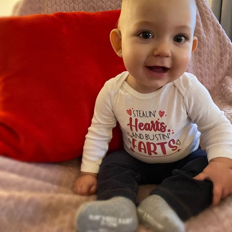Stealin' Hearts and Bustin' Farts Baby Bodysuit