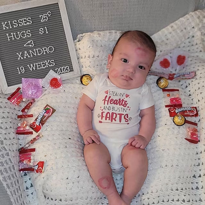 Stealin' Hearts and Bustin' Farts Baby Bodysuit