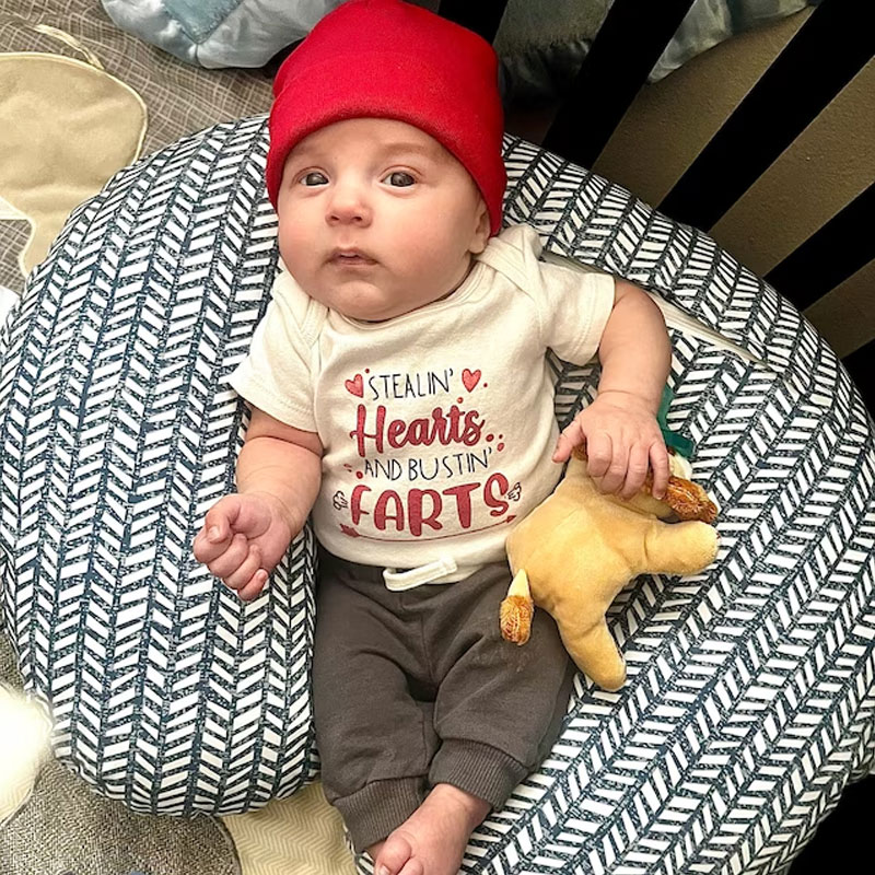 Stealin' Hearts and Bustin' Farts Baby Bodysuit