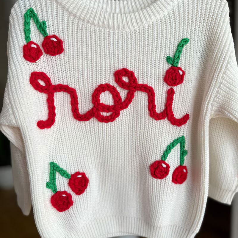 knit hand embroidered baby cherry beach sweater