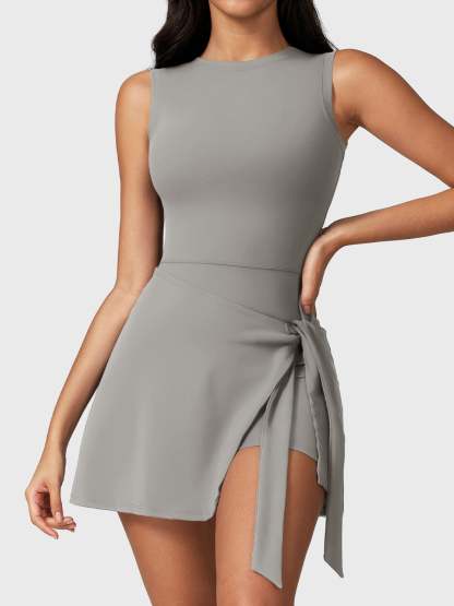 Front view of Yeoreo Renee Sleeveless Tennis Dress in Grey – boat neckline, tie waist design