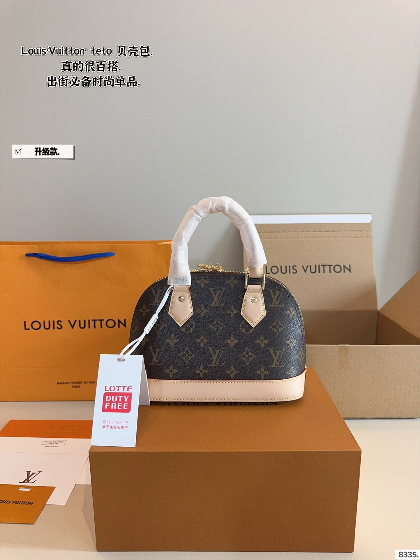 L style handbag