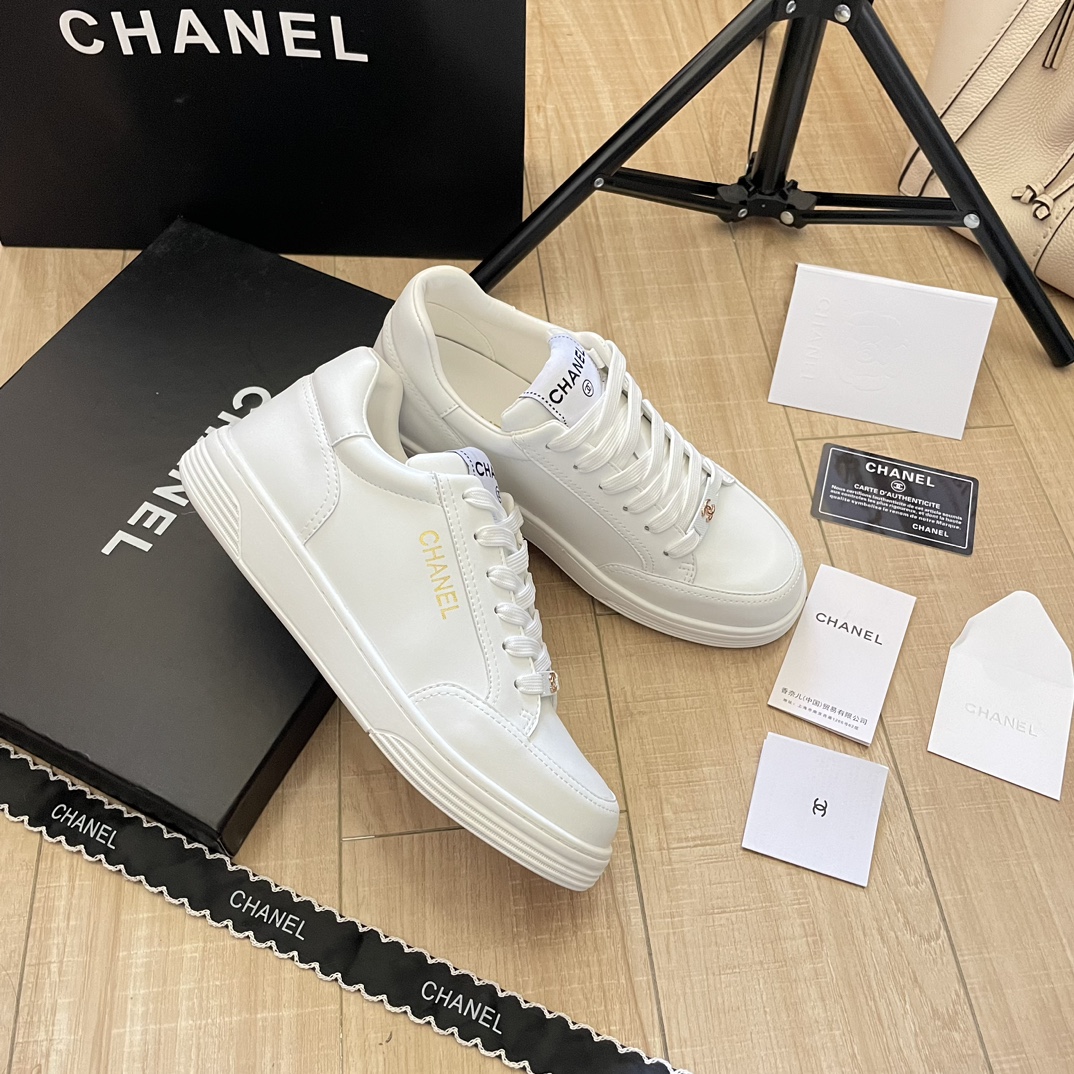 C*L gold buckle letter sneakers