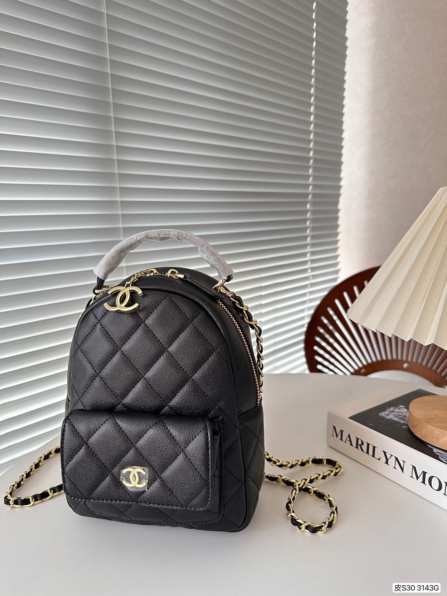 Chanel Leather Chain Backpack