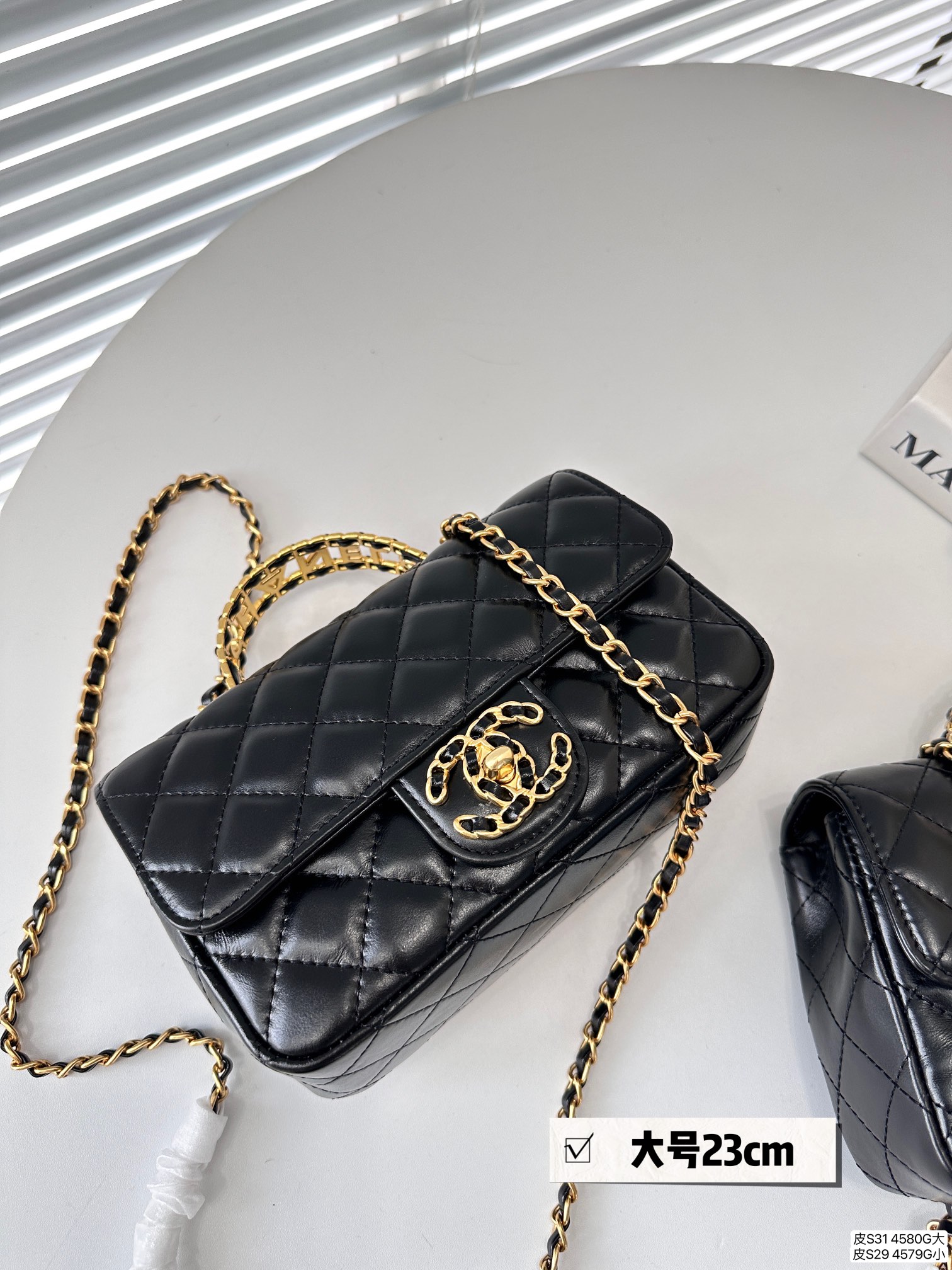 C*L Cowhide CF Hollow Black Diamond Handle Chain Bag