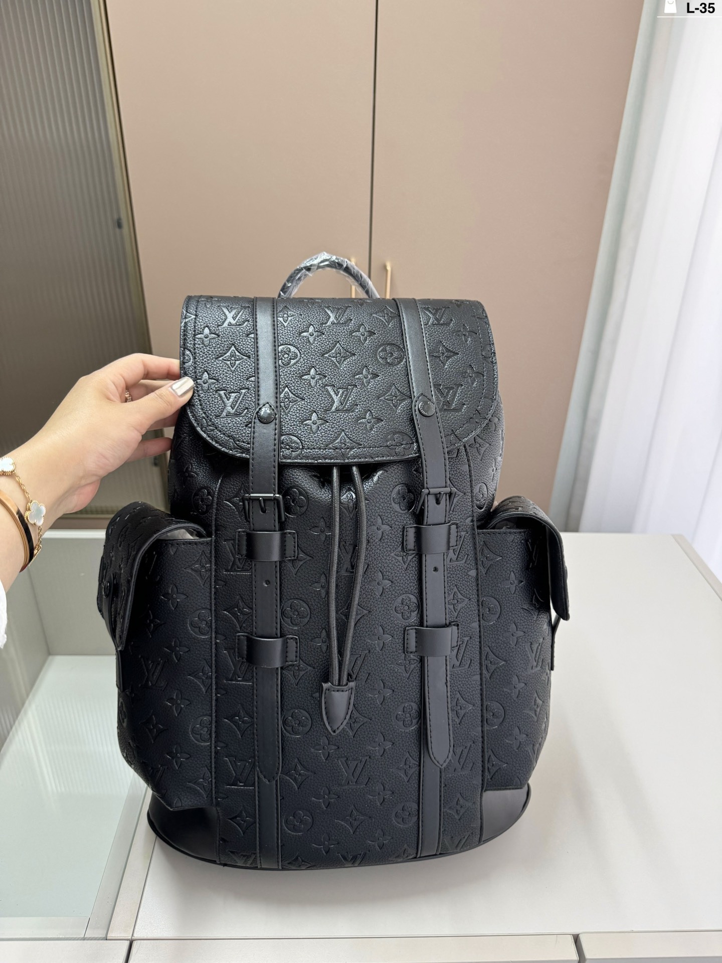 L style printed backpack