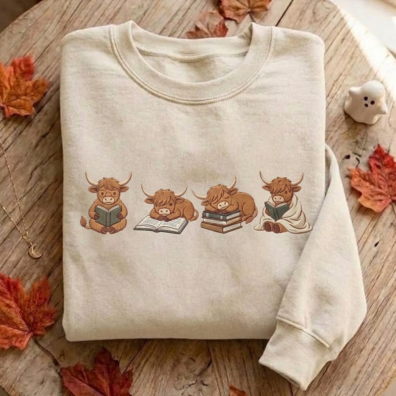 Embroidered Highland Cow Reading Sweatshirt