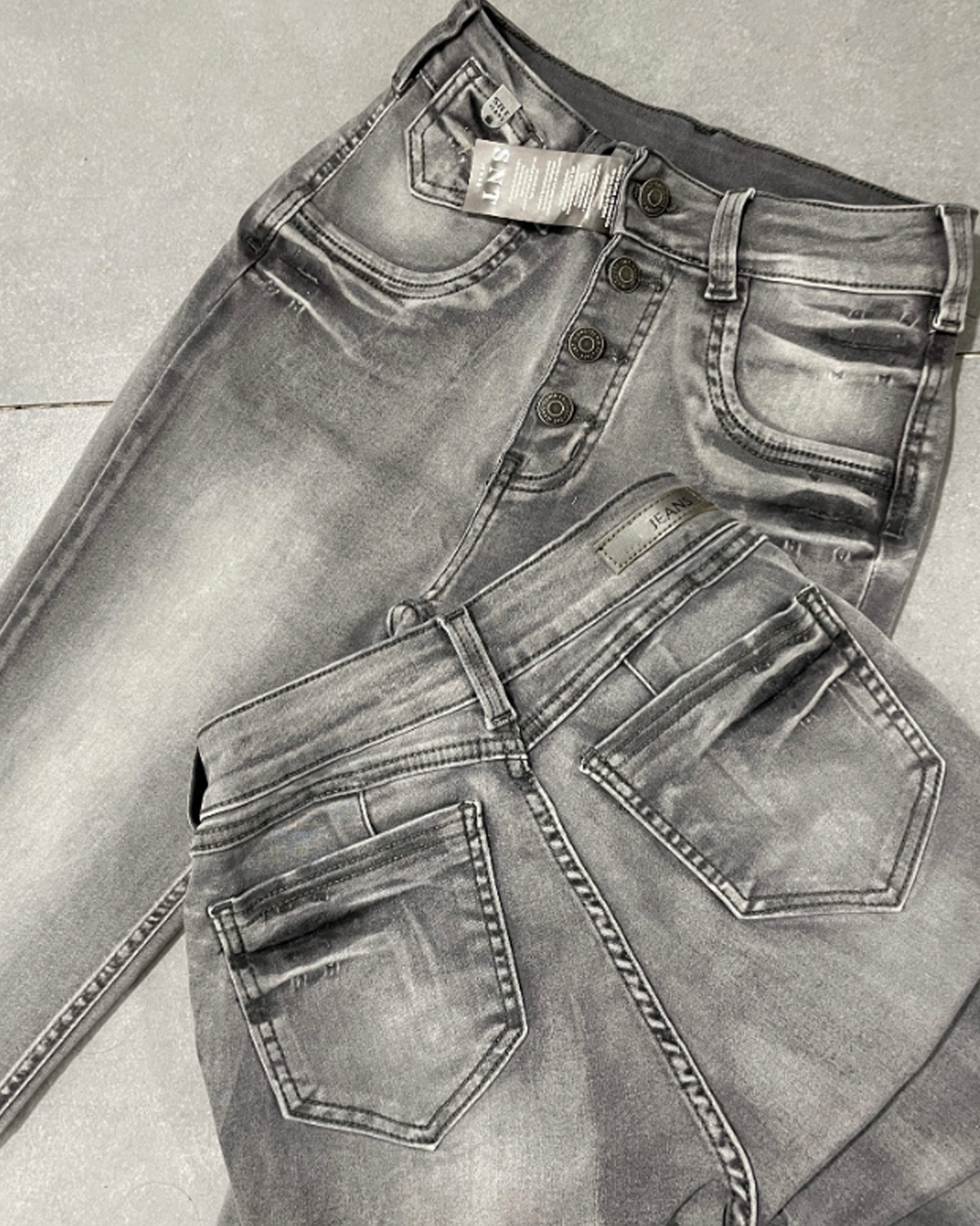 Vaqueros pitillo grises degradados