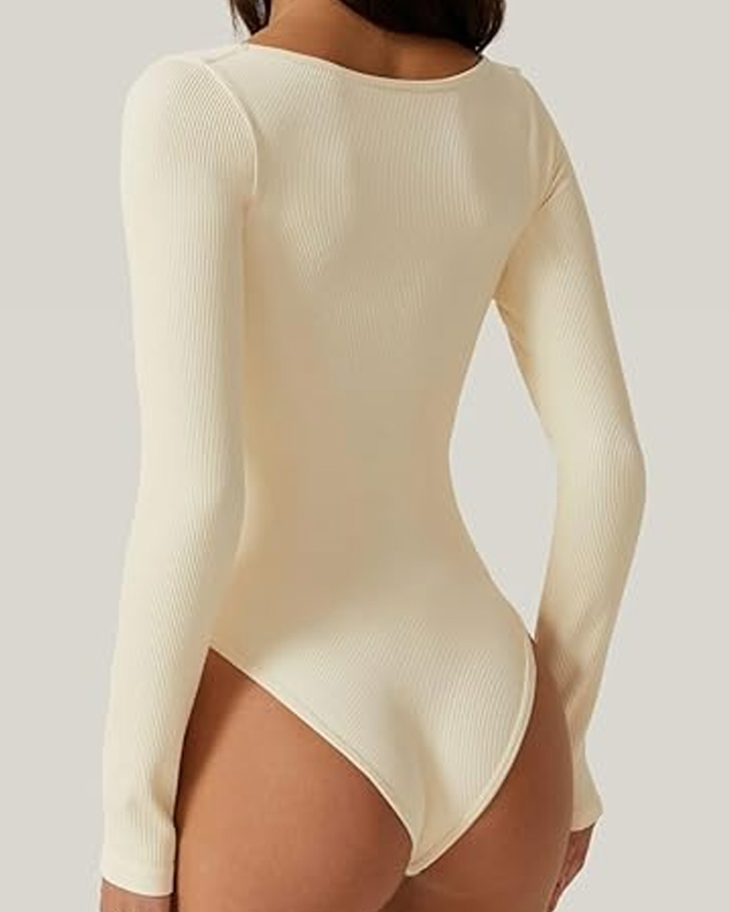 Mono de punto acanalado con cuello ancho