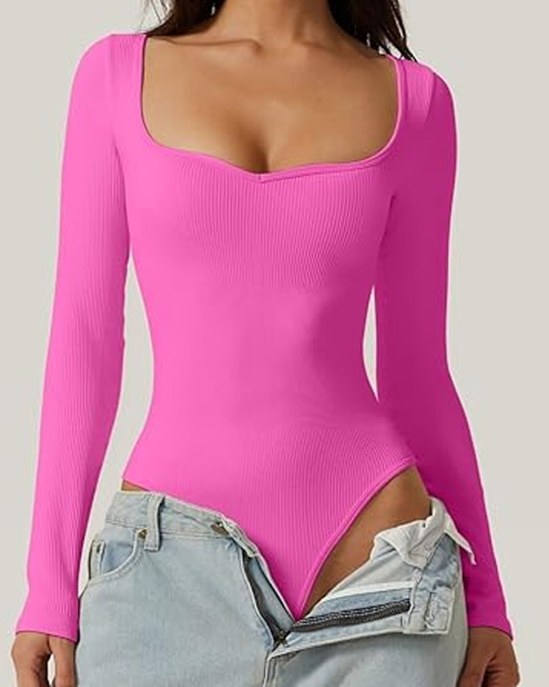 Mono de punto acanalado con cuello ancho