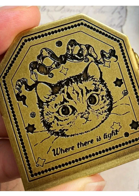 Telephone cat TN brass paper clips