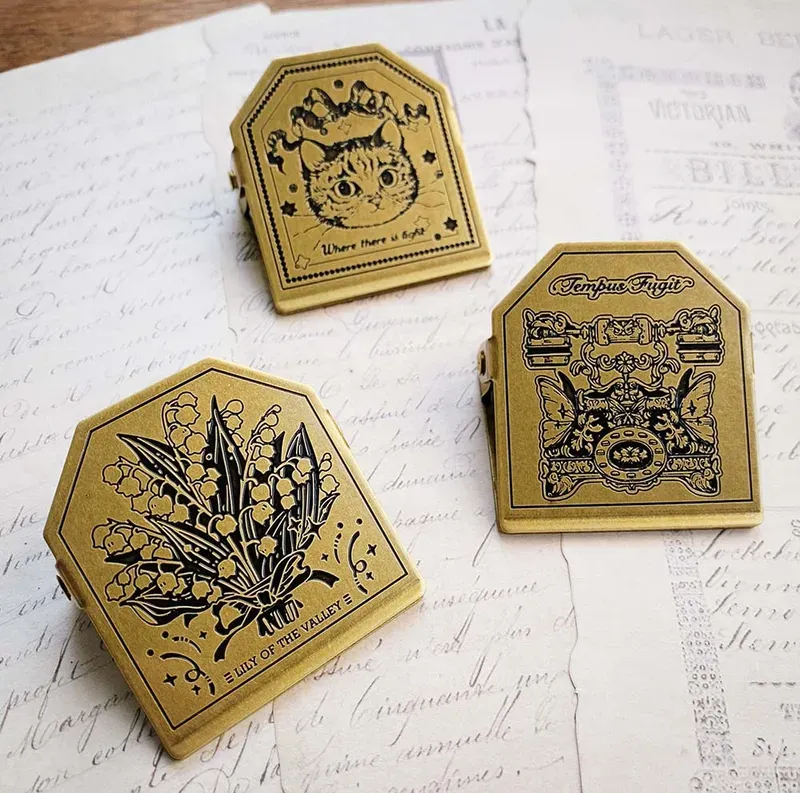 Telephone cat TN brass paper clips
