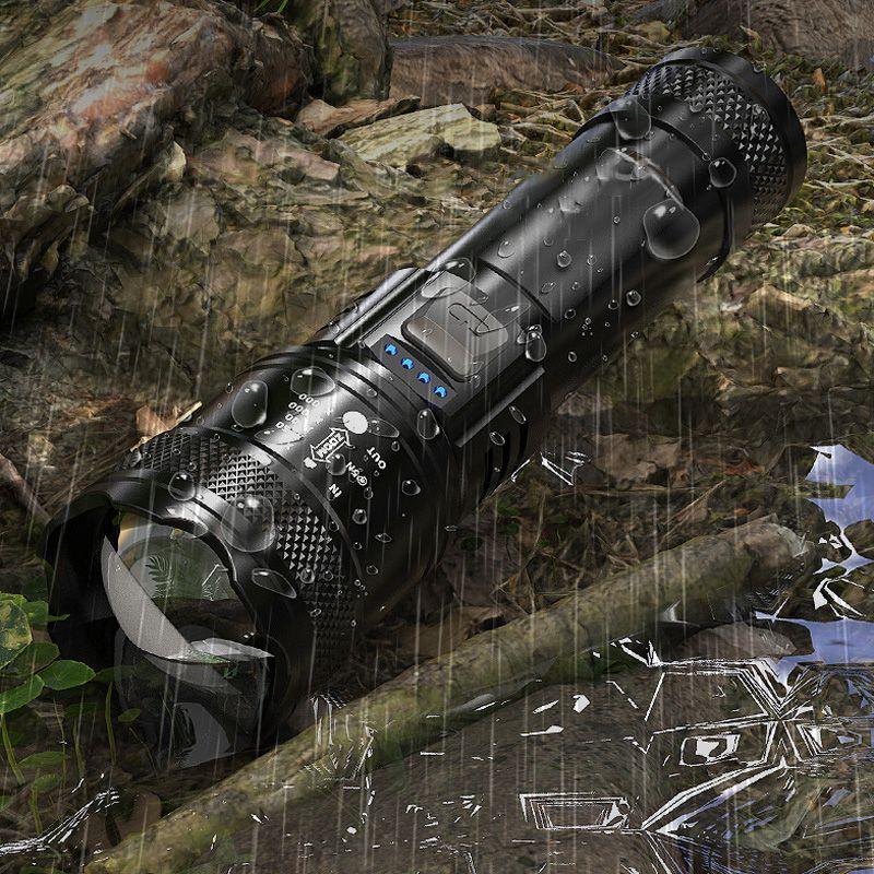 Waterproof black tactical flashlight with LED display outdoors in rain, clarioy auto tools