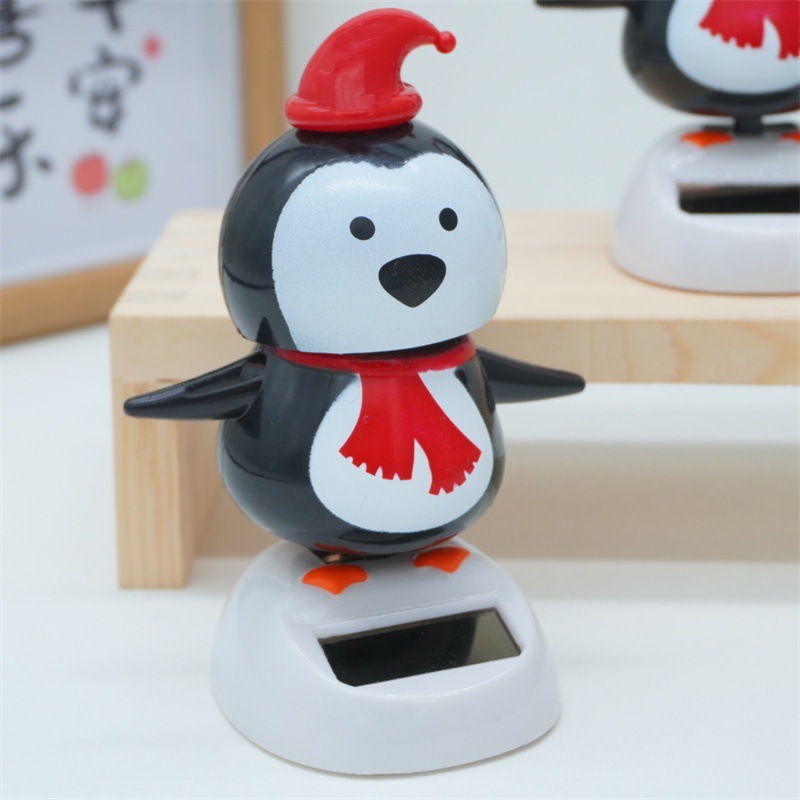 Christmas Solar-Powered Wobbling Figurines | Your Car’s Festive Co-Pilot This Holiday Season