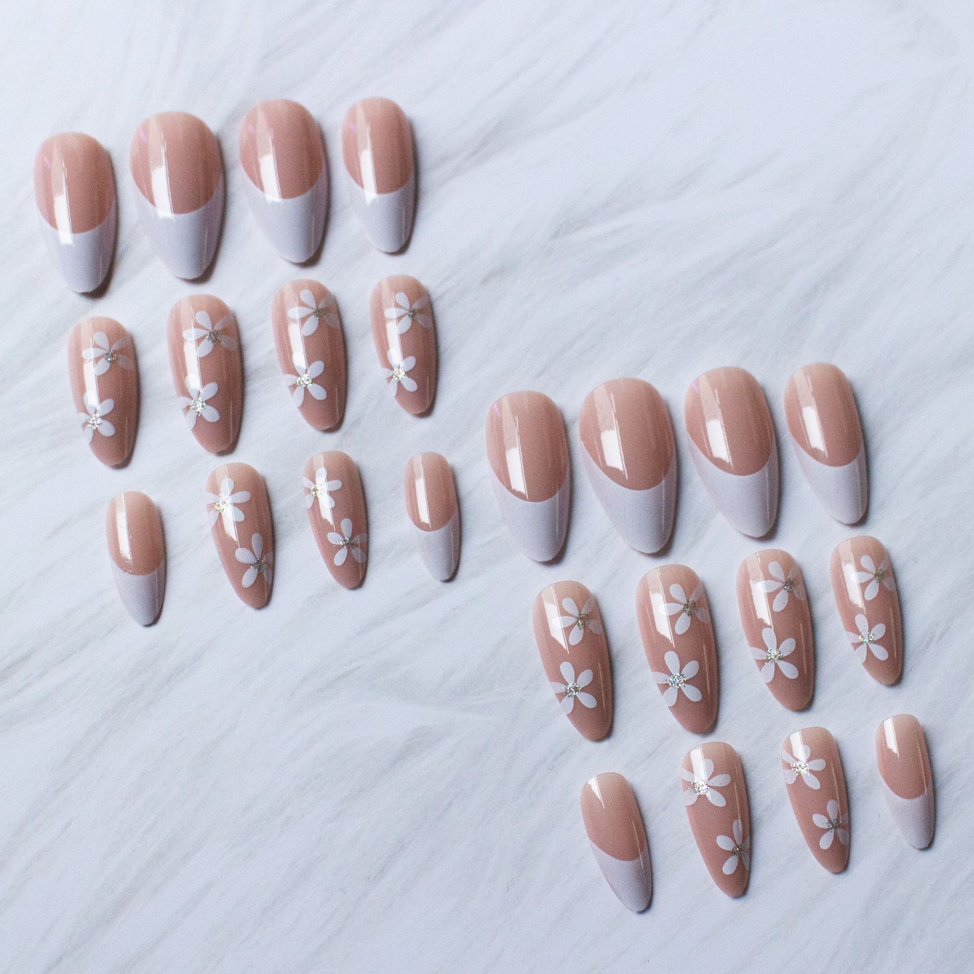 White flowers French tips medium nail