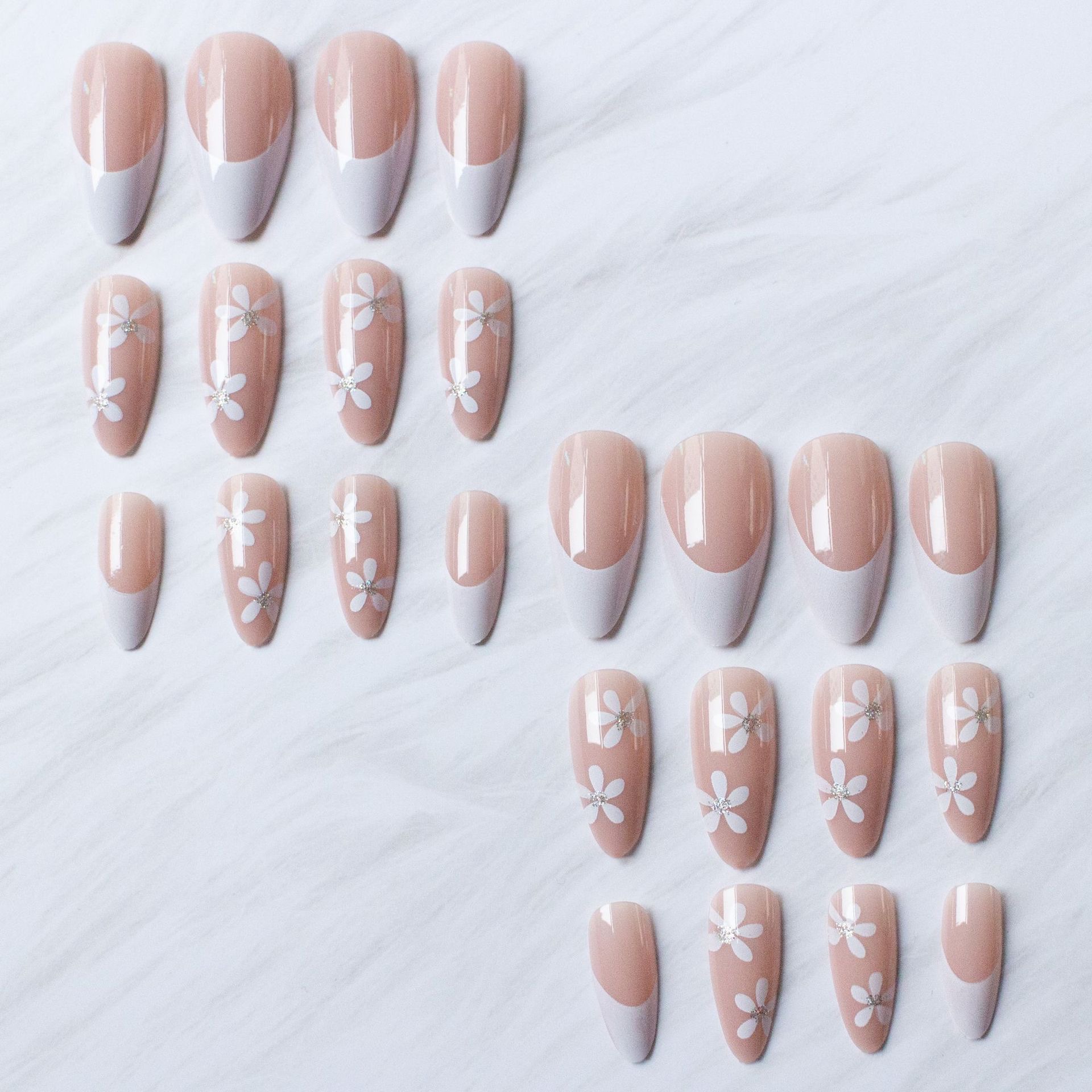 White flowers French tips medium nail