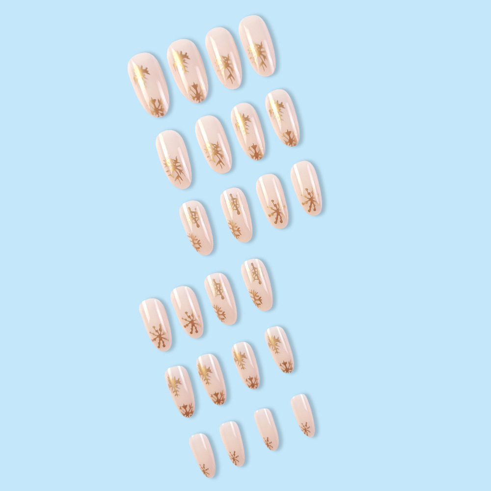 Golden Snowflake Christmas nails