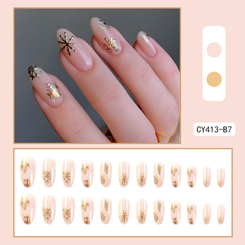 Golden Snowflake Christmas nails