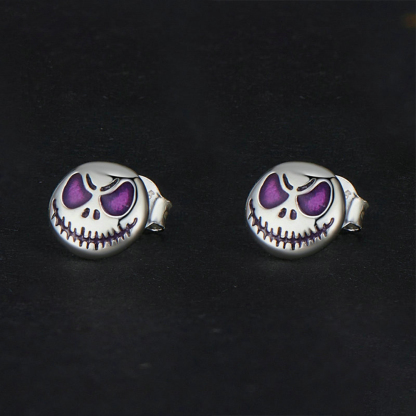 Glow-in-the-dark smiley face earrings