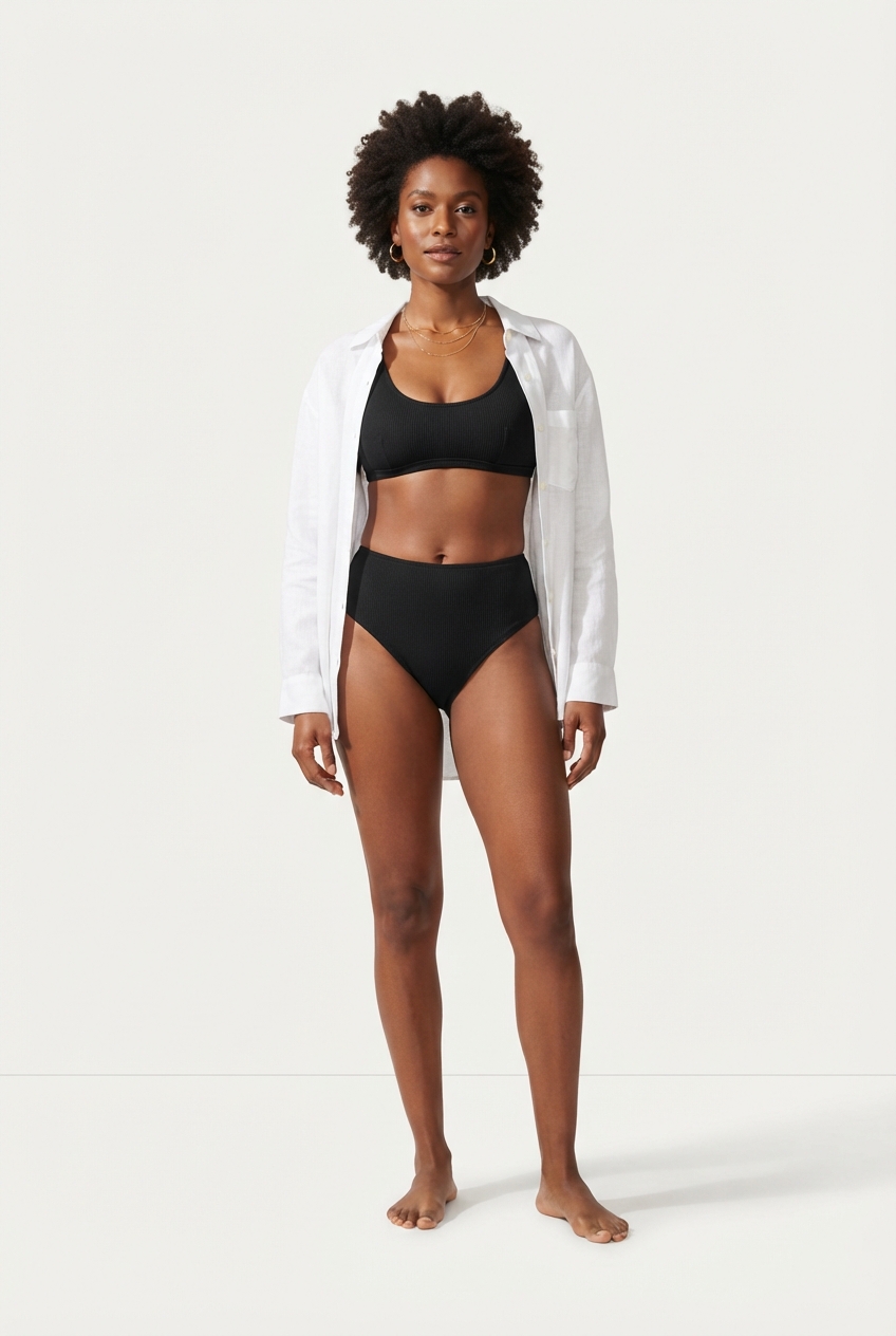 Black high-waist bikini set with sculpting Mediterranean-inspired silhouette