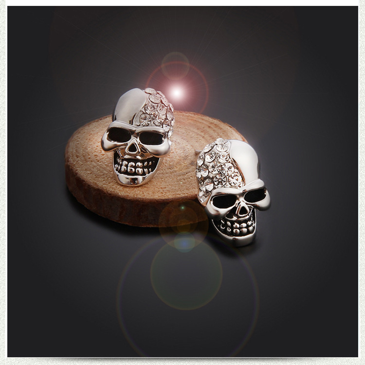 Half Diamond Skull Stud Earrings