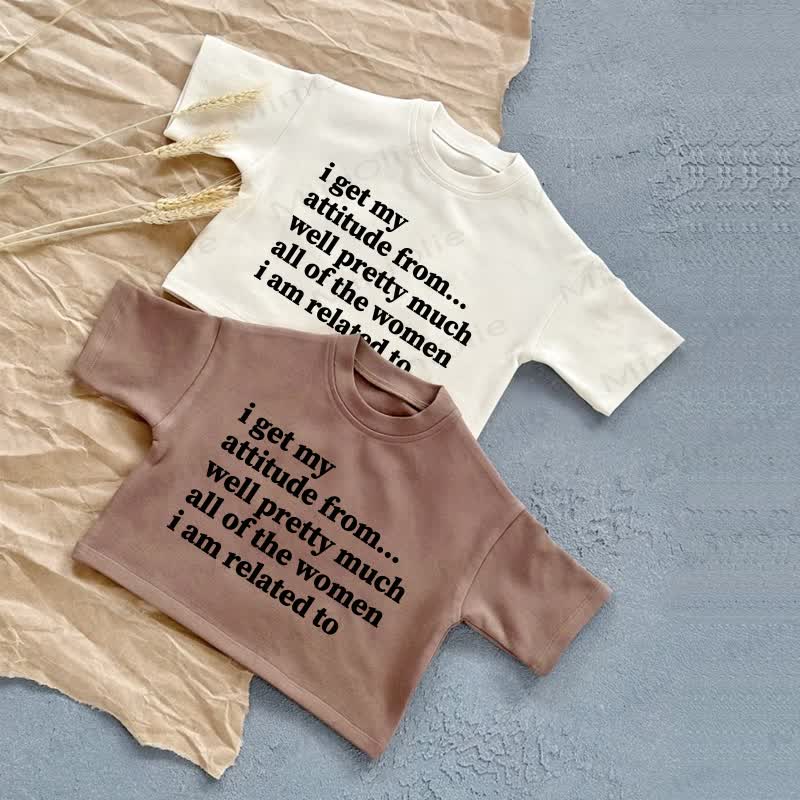 I GET MY ATTITUDE FROM…WELL PRETTY MUCH ALL OF THE WOMEN I AM RELATED TO Baby White/Brown Slogan Casual T-Shirt - image 3