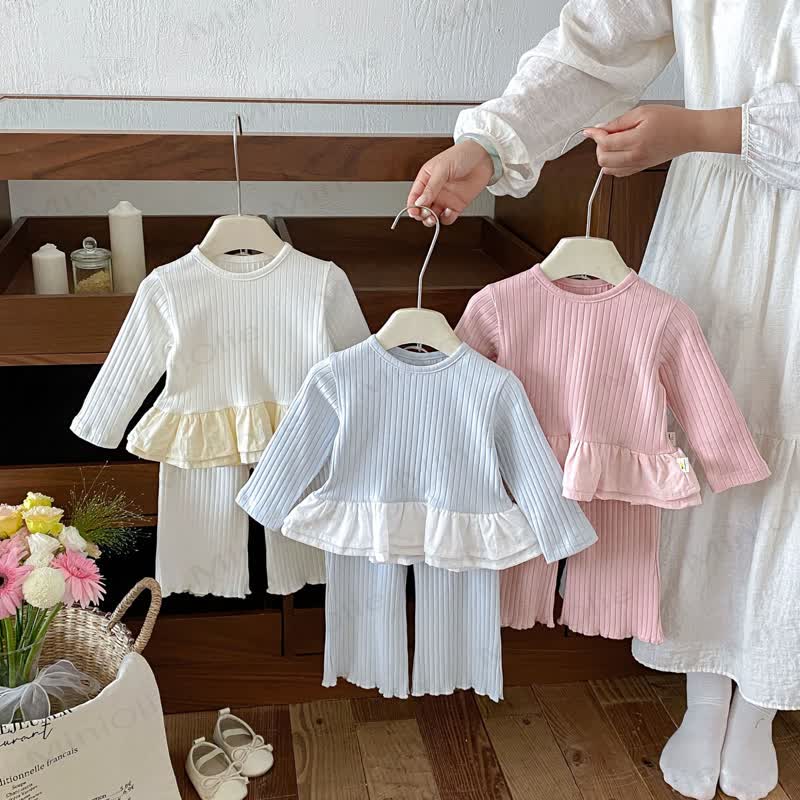 Baby Solid Color Long Sleeve Peplum Top and Pants 2-piece Set - image 1