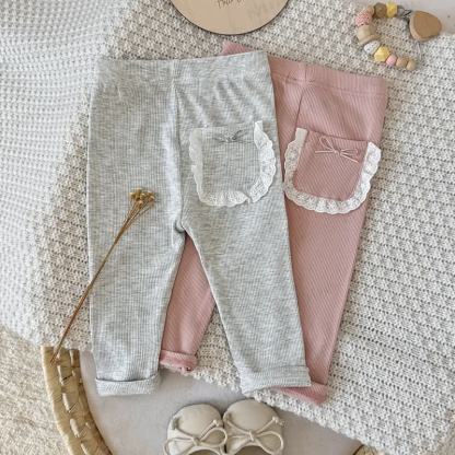 Baby Girl Solid Color Ribbed Lace Pocket Leggings - image 1
