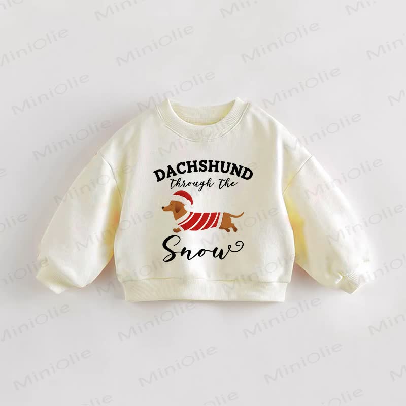 DACHSHUN THROUGH THE SNOW Baby Cream Sweatshirt - Cream - 3-5T - image 1