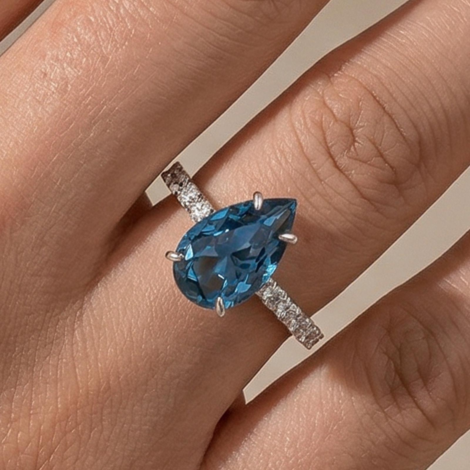 pear shaped blue sapphire pave ring