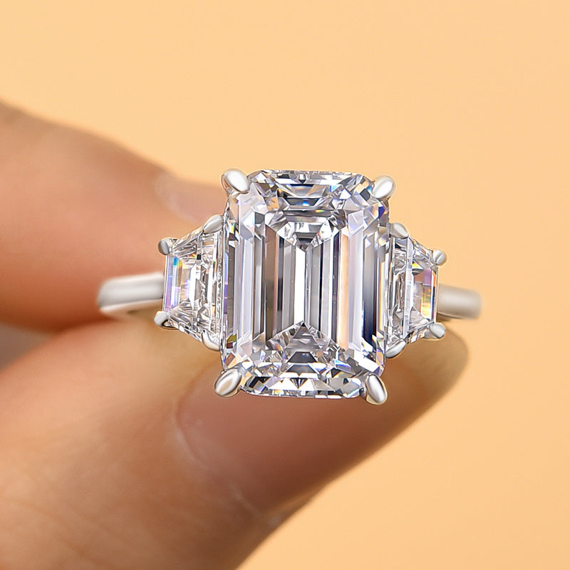 3 stone emerald cut engagement rings